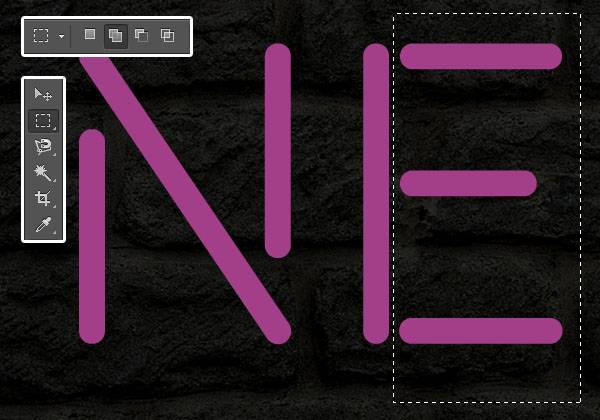 Неоновые буквы на кирпичной стене